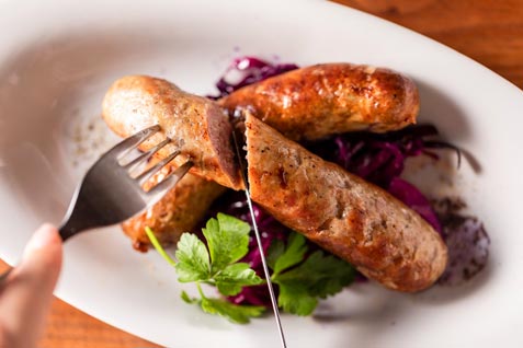 『Cafe＆Rotisserie LA COCORICO 上野の森さくらテラス店』のいちおし「COCORICO自家製あらびきソーセージ」