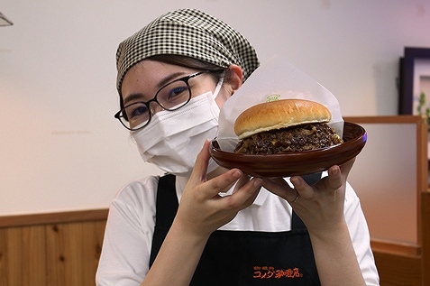 「コメ牛」と店員さん