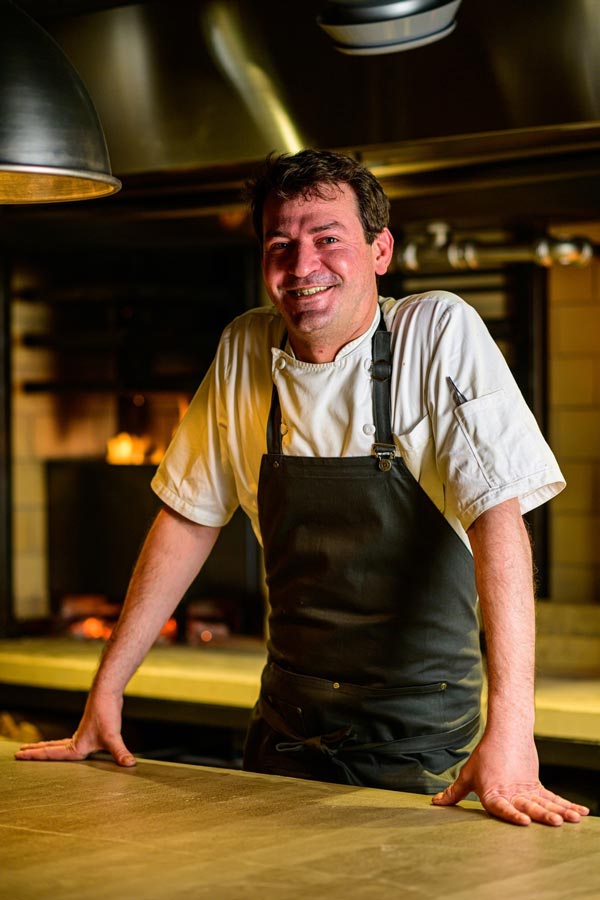「SMOKE DOOR」の料理長