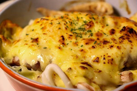 「東北うまいもの酒場 プエドバル」の「八戸スルメイカのポンポン焼き」