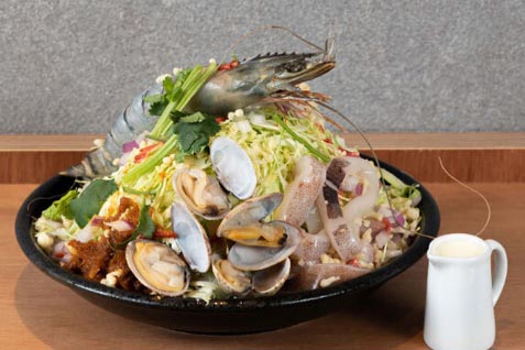 『大衆居酒屋 もんじゃ酒場 だしや 池袋東口店』の「パクチー香るトムヤムクンもんじゃ」